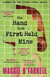 The hand that first held mine
